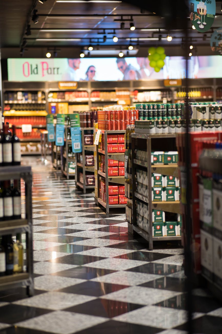empty grocery store aisle at night