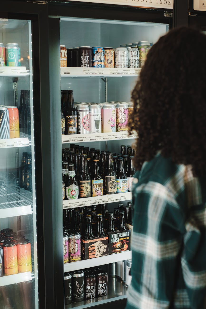 photo of beer bottles in a refrigerator